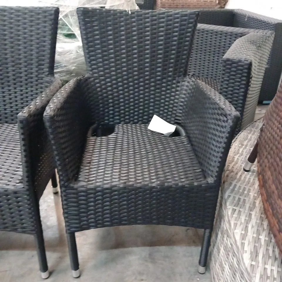 FOUR RATTAN EFFECT STACKING GARDEN CHAIRS