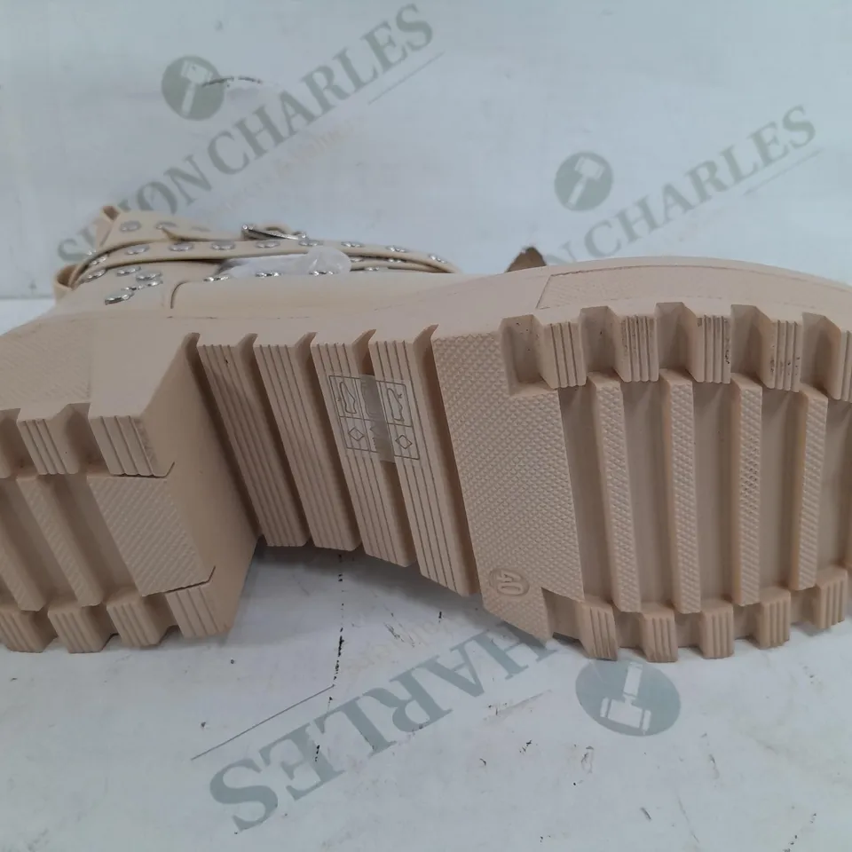 PAIR OF GIRLHOOD BUCKLE EMBELISHED BOOTS IN CREAM - SIZE 40