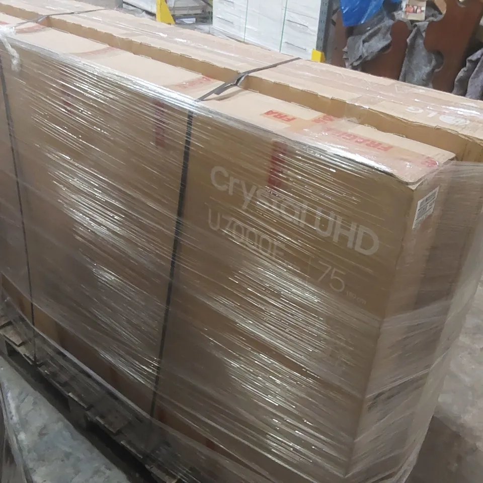 PALLET CONTAINING A LARGE QUANTITY OF ASSORTED DAMAGED TVs