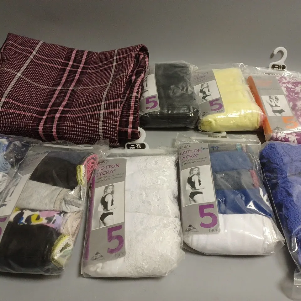 MEDIUM BOX OF ASSORTED CLOTHING PRODUCTS TOO INCLUDE TROUSERS , UNDERWEAR AND SHIRTS 