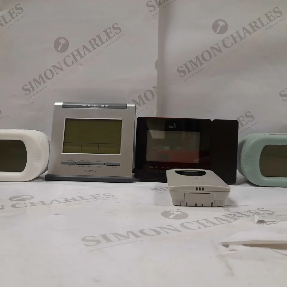 LOT OF APROX 4 ACCTIM DIGITAL CLOCKS