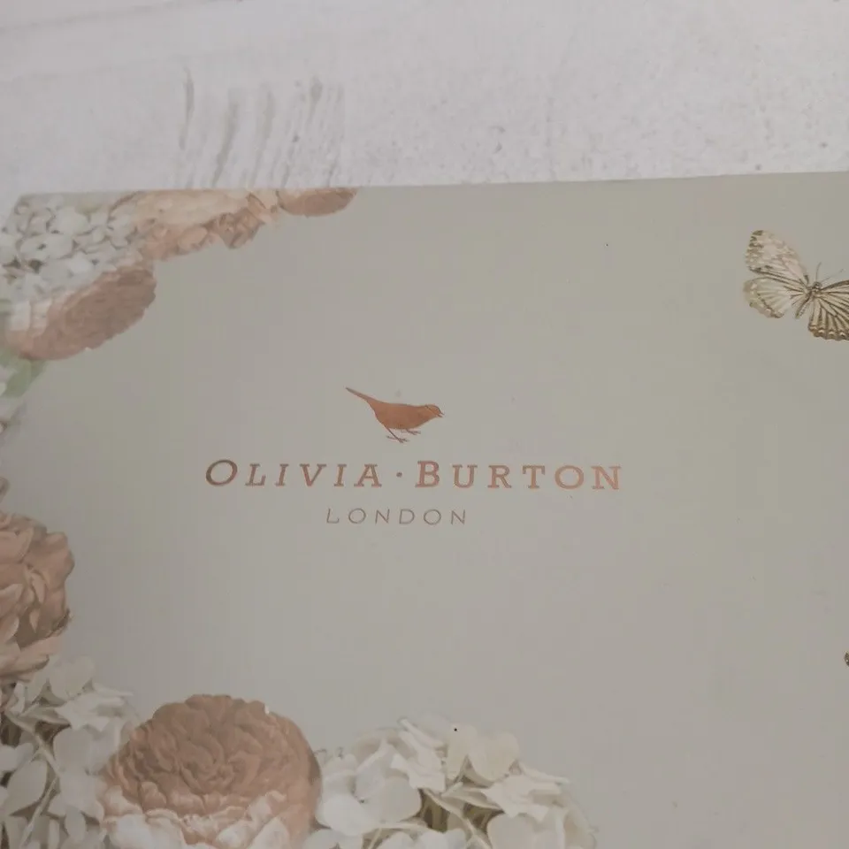OLIVIA BURTON LONDON BOX WITH A MIX OF COSMETIC GOODS INSIDE