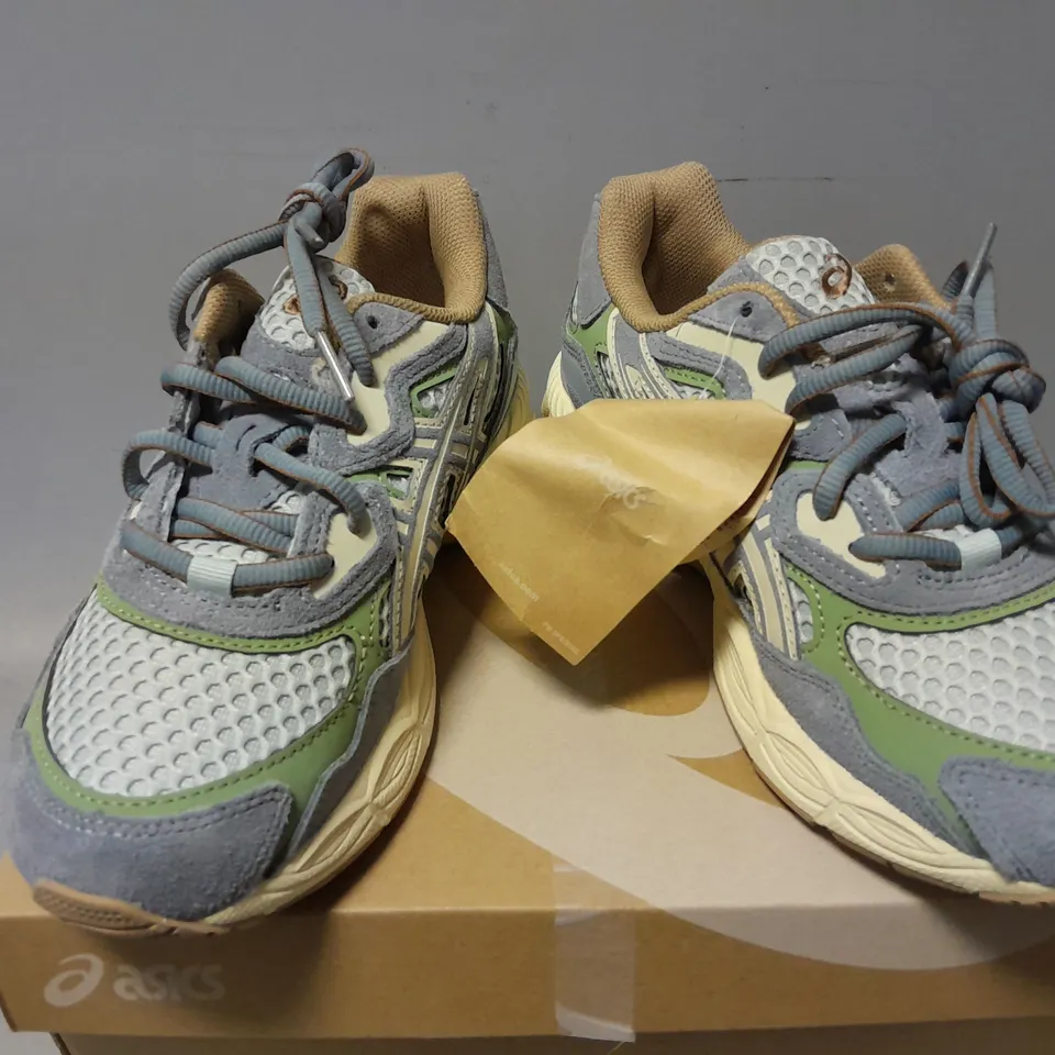 BOXED PAIR OF ASICS GEL-NYS TRAINERS IN COLD MOSS/FJORD GREY - UK 4