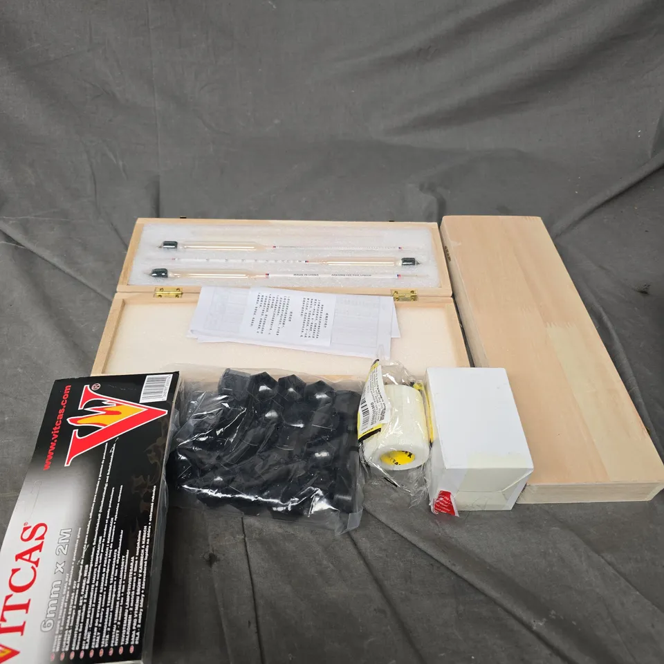 APPROXIMATELY 15 ASSORTED HOUSEHOLD ITEMS TO INCLUDE - PORTTAPE , STOVE ROPE , ETC 