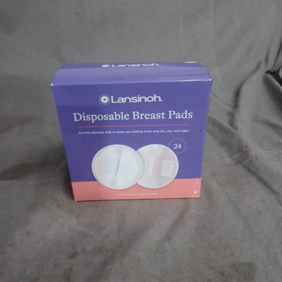 BOX OF APPROXIMATELY 20 ASSORTED HOUSEHOLD ITEMS INCLUDING MEASURING JUGS , DISPOSABLE BREAST PADS AND CHRISTMAS WRAPPING PAPER