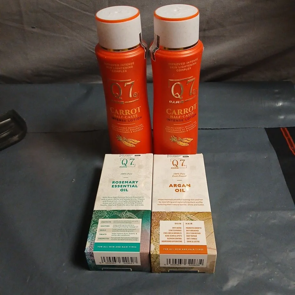 4 X Q7 PARIS PRODUCTS: 2 X CARROT HALF CASTE INTENSE LOTION 300ML, ARGAN OIL 30ML, ROSEMARY ESSENTIAL OIL 30ML