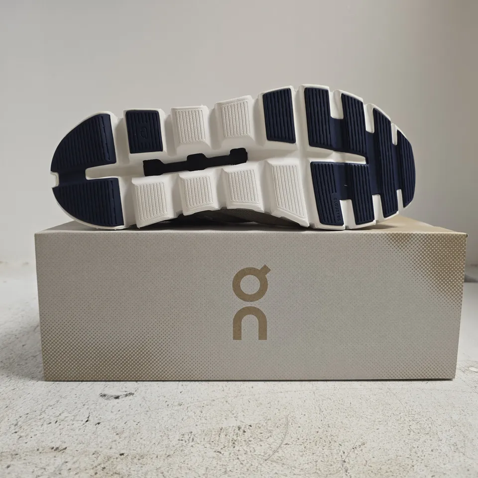 BOXED PAIR OF ON CLOUD 6 COAST TRAINERS IN PELICAN/MIDNIGHT SIZE UK 9