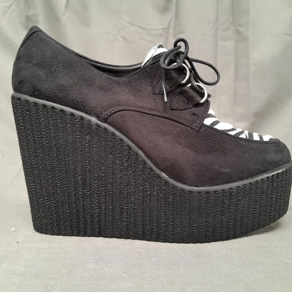 BOX OF APPROXIMATELY 10 BOXED PAIRS OF CASANDRA HIGH PLATFORM WEDGES IN BLACK/ZEBRA PRINT - VARIOUS SIZES