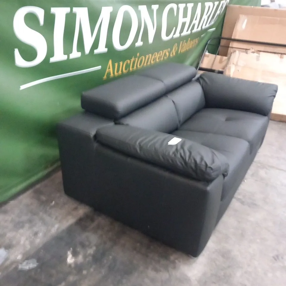 DESIGNER BLACK FAUX LEATHER TWO SEATER SOFA WITH SQUARE PANEL DETAIL AND ADJUSTABLE HEADRESTS