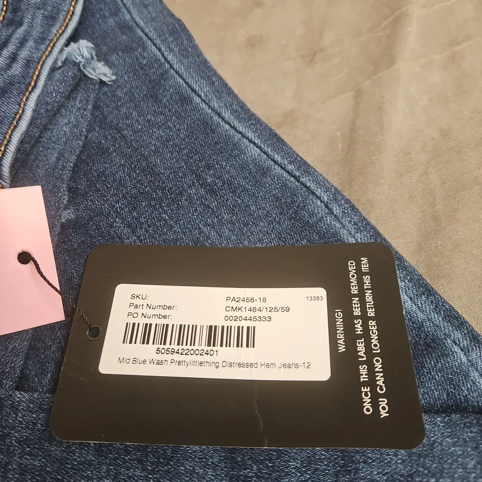 PRETTYLITTLETHING JEANS – MID BLUE DENIM, DISTRESSED HEM, UK 12