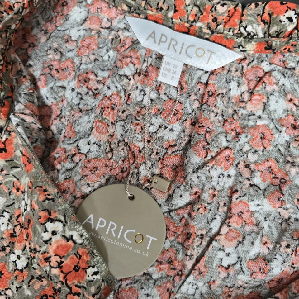 APRICOT DITSY RUFFLE SLEEVE TIE NECK TOP – FLORAL ORANGE (UK 12 / EUR M / US M)