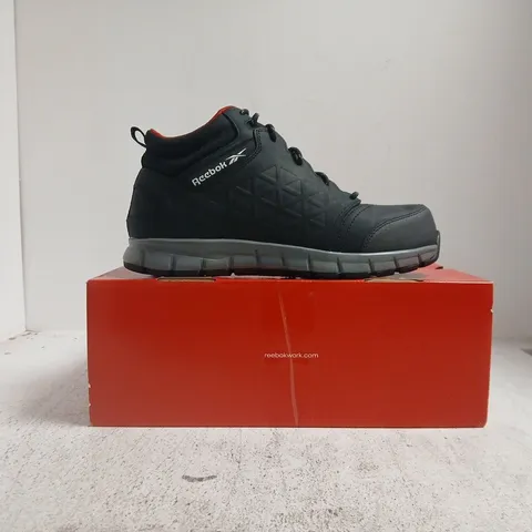 BOXED PAIR OF REEBOK EXCEL LIGHT SAFETY BOOTS IN BLACK SIZE UK 9