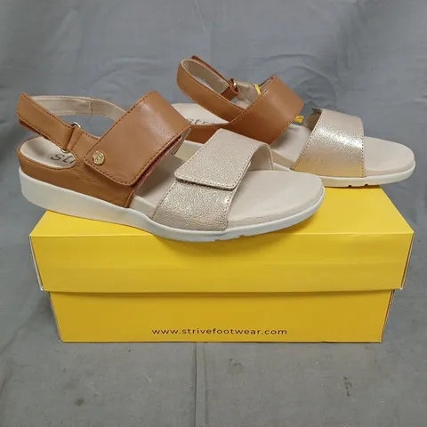 BOXED PAIR OF STRIVE RIVIERA II SANDALS IN TAN/GOLD SIZE UK 6