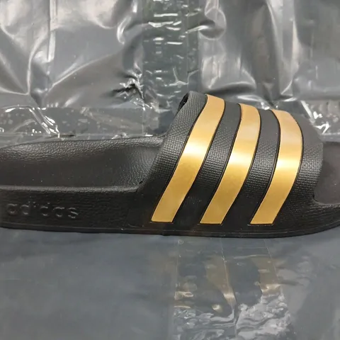 PAIR OF ADIDAS ADILETTE AQUA SLIDES IN BLACK/GOLD SIZE UK 9