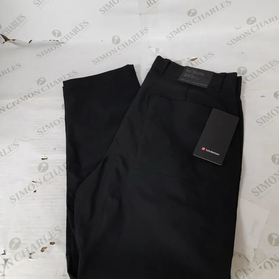 LULULEMON RELAXED TAPERED TROUSER IN BLACK SIZE 34W 