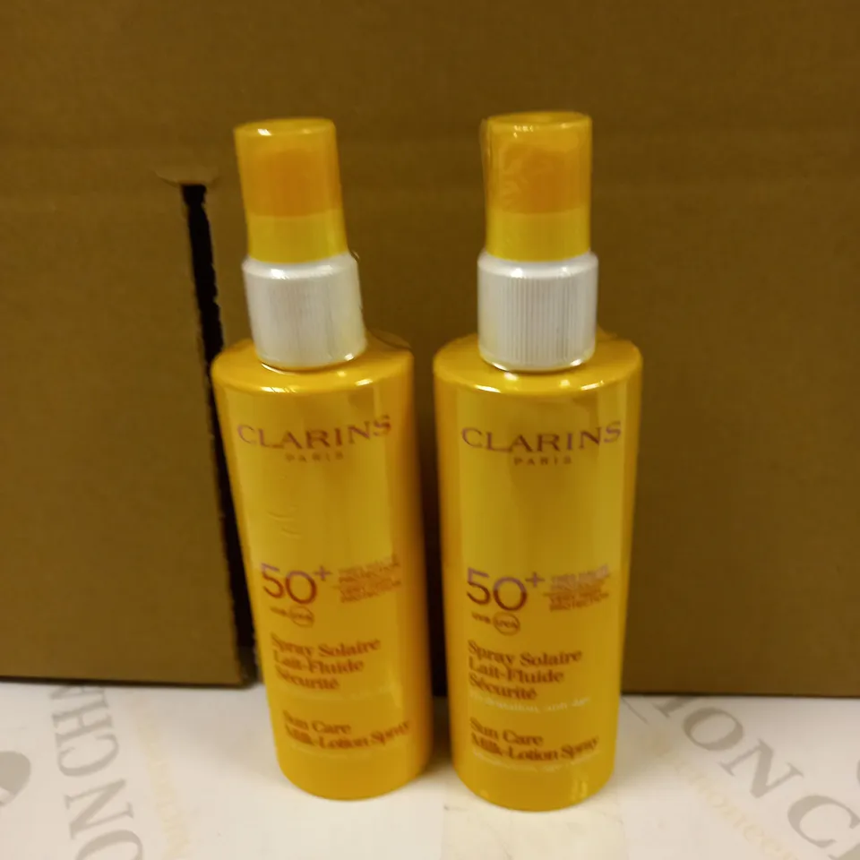 LOT OF 2 CLARINS SUN CARE MILK-LOTION SPRAY