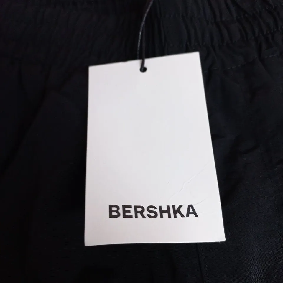 BERSHKA BLACK TRACK PANTS WITH WHITE SIDE PIPING – ELASTICATED WAIST UK L
