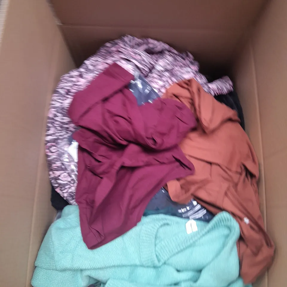 LARGE QAUNTIITY OF ASSORTED CLOTHES IN VARIOUS COLORS AND SIZES TO INCUDED DRESSES, T-SHIRTS , TROUSERS 