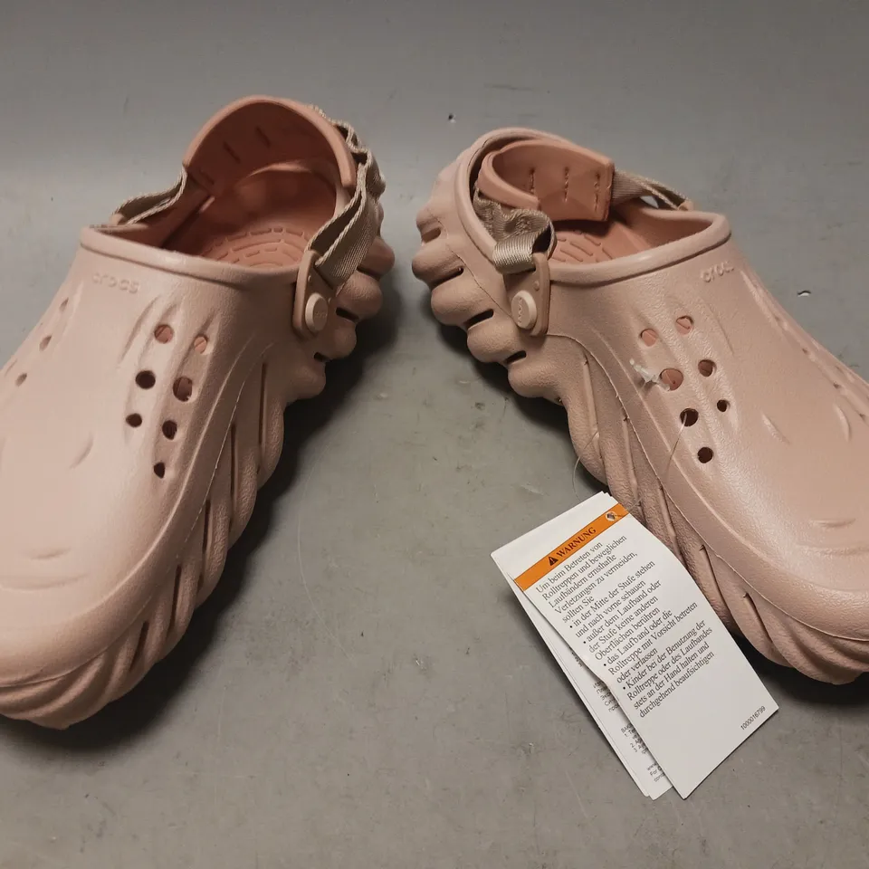 PAIR OF CROCS ECHO CLOGS IN PINK UK SIZE M6/W7