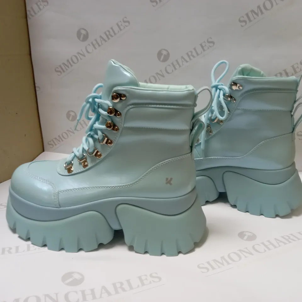 DESIGNER KOI VEGAN GOOGEY BABY BLUE PLATFORM BOOTS