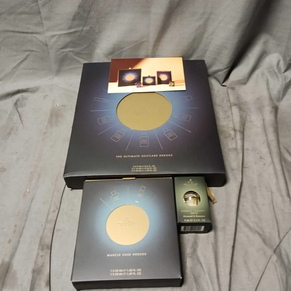 AROMATHERAPY ASSOCIATES GIFT SET: THE ULTIMATE SELF-CARE HEROES, MUSCLE EASE HEROES & FOREST THERAPY IN NAVY BAG