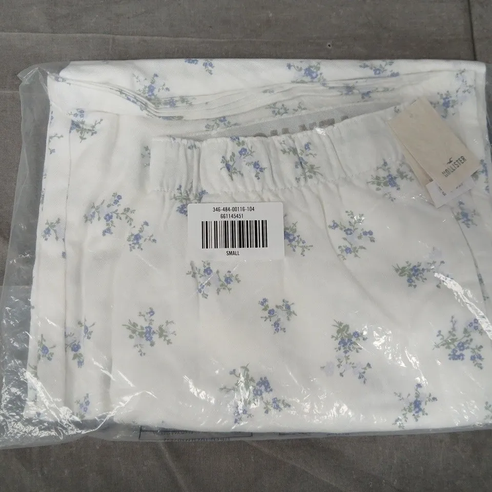 BAGGED HOLLISTER FLORAL TROUSERS IN WHITE MULTI - SMALL