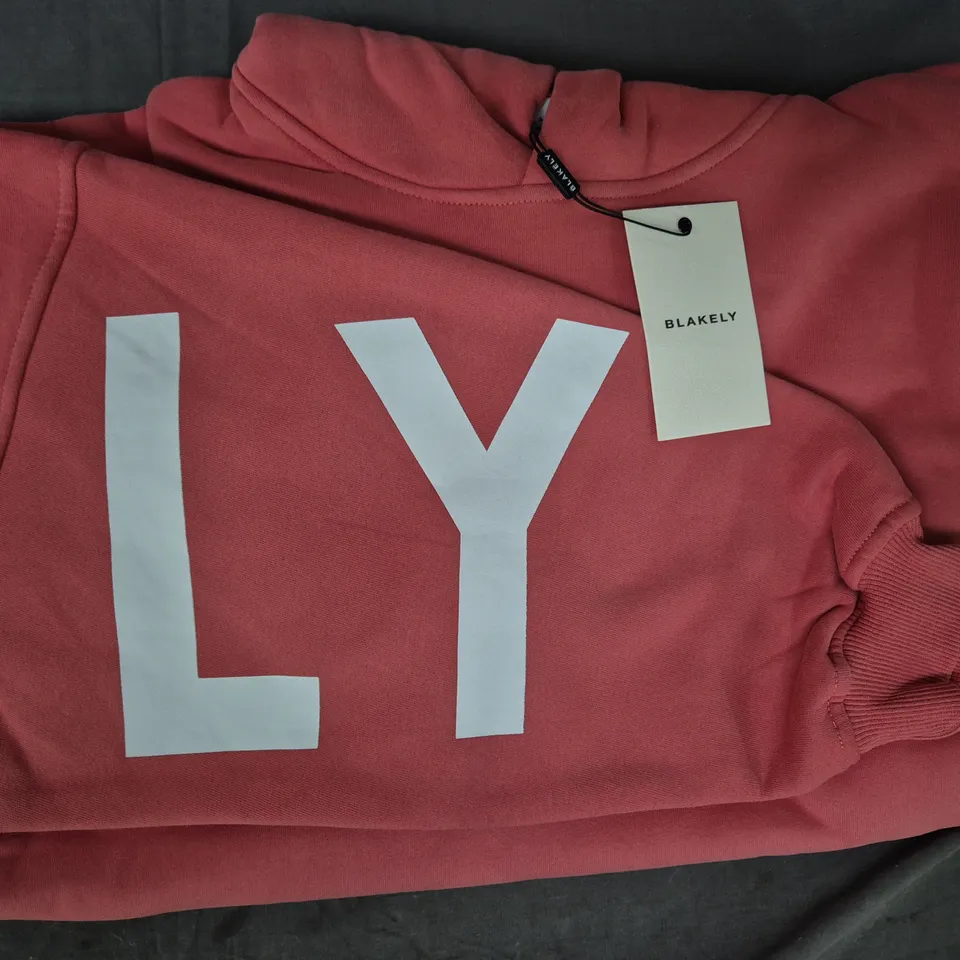 BLAKELY OVERSIZED LONG SLEEVE HOODIE IN SALMON SIZE MEDIUM