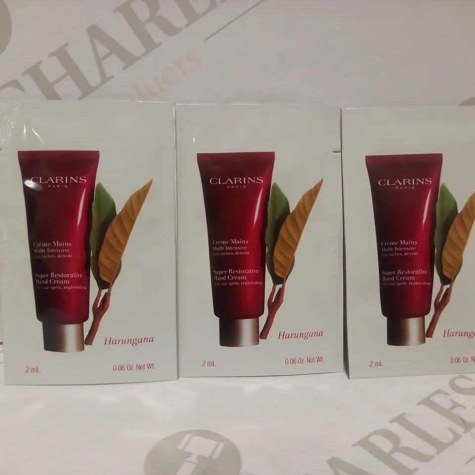 BOX OF APPROX 500 CLARINS SUPER RESTORATIVE HAND CREAM 2ML