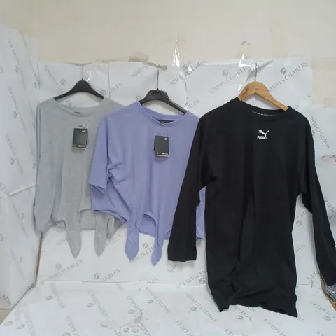 ASSORTED PUMA PIECES OF CLOTHING TO INCLUDE CROP TEES, DRESS TEE, AND SPORT SHORTS ETC.