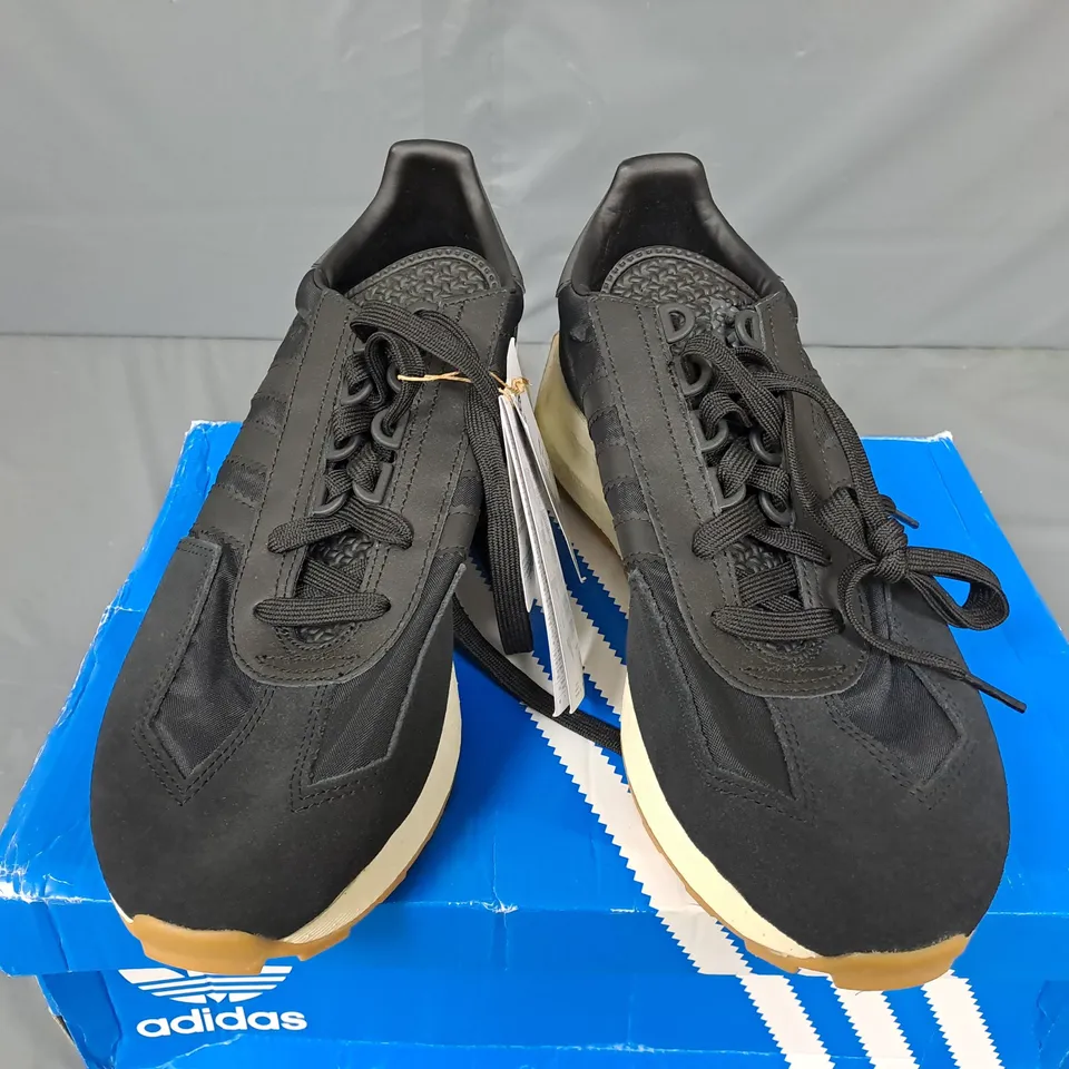 BOXED PAIR OF ADIDAS RETROPY E5 SHOES IN BLACK - UK 10.5