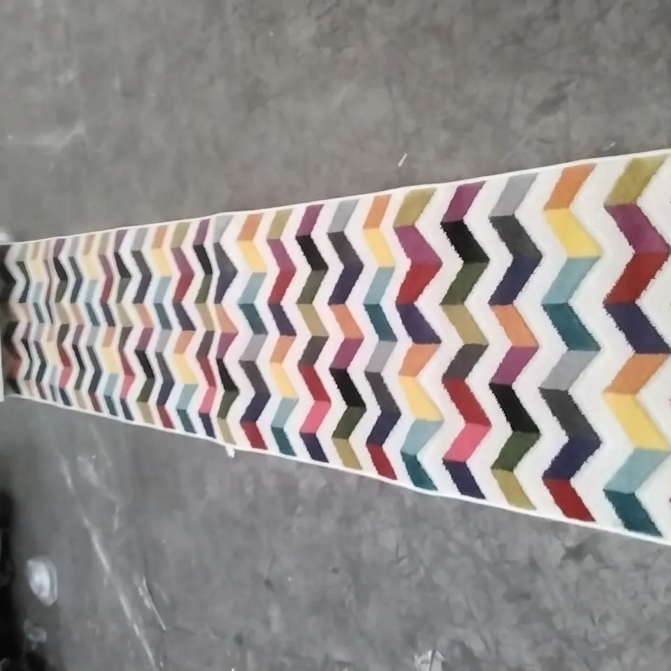 STILLAGE OF APPROXIMATELY 24 DESIGNER RUGS