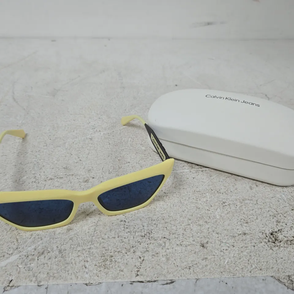 CALVIN KLEIN JEANS SUNGLASSES – YELLOW FRAME WITH BLUE LENSES