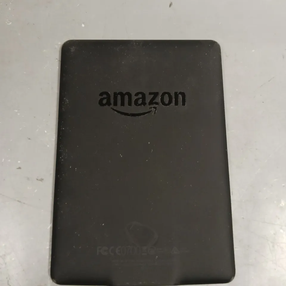AMAZON KINDLE PAPERWEIGHT E-READER 