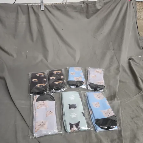 APPROXIMATELY 7 PAIRS OF DOG /CAT THEMED SOCKS - SIZE UNSPECIFIED 