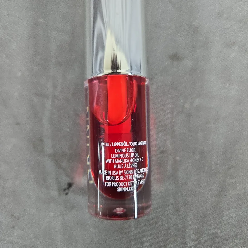 SKINN DIVINE ELIXIR LUMINOUS LIP OIL WITH MANUKA HONEY + C – RED