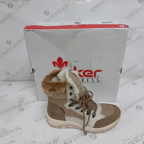 BOXED PAIR OF RIEKER CREAM WINTER FUR HIKE BOOTS IN SIZE 5