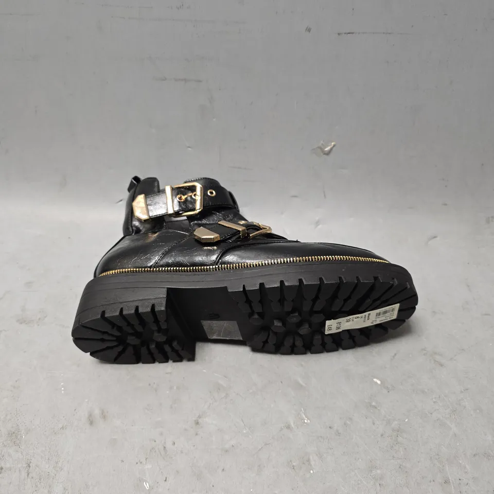 UNBOXED PAIR OF RIVER ISLAND BUCKLE STRAP BOOTS IN BLACK - 6