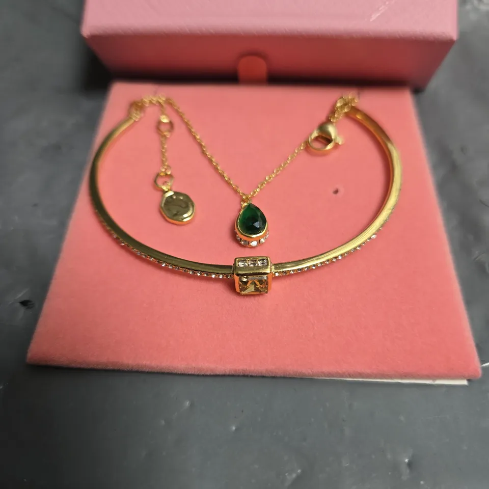 SWAROVSKI GOLD-TONE BRACELET AND PENDANT NECKLACE SET WITH EMERALD-GREEN GEMSTONE – BOXED