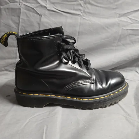 BOXED PAIR OF DR.MARTENS CAMO BOOTS - UK SIZE UNSPECIFIED