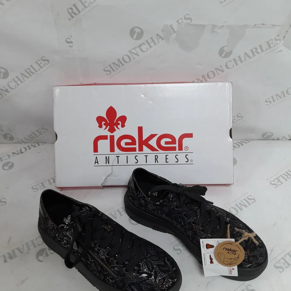 BOXED PAIR OF RIEKER FLORAL TRAINERS IN BLACK SIZE 4