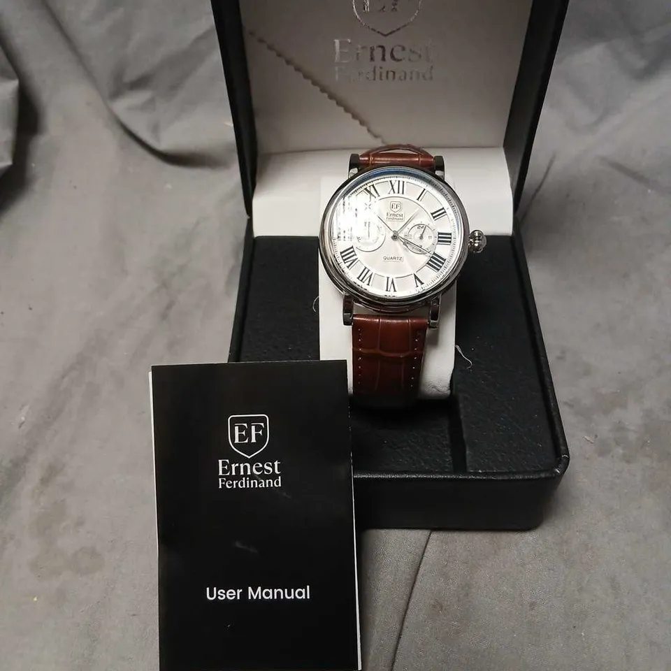 ERNEST FERDINAND WRISTWATCH – SILVER DIAL, ROMAN NUMERALS, BROWN LEATHER STRAP (BOXED)