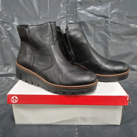 BOXED PAIR OF RIEKER WEDGE ANKLE BOOTS IN BLACK SIZE 6