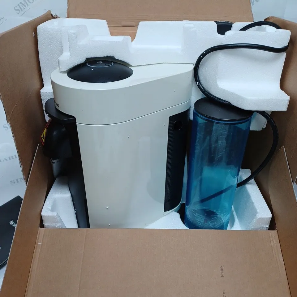 BOXED NESPRESSO VERTUO PLUS 