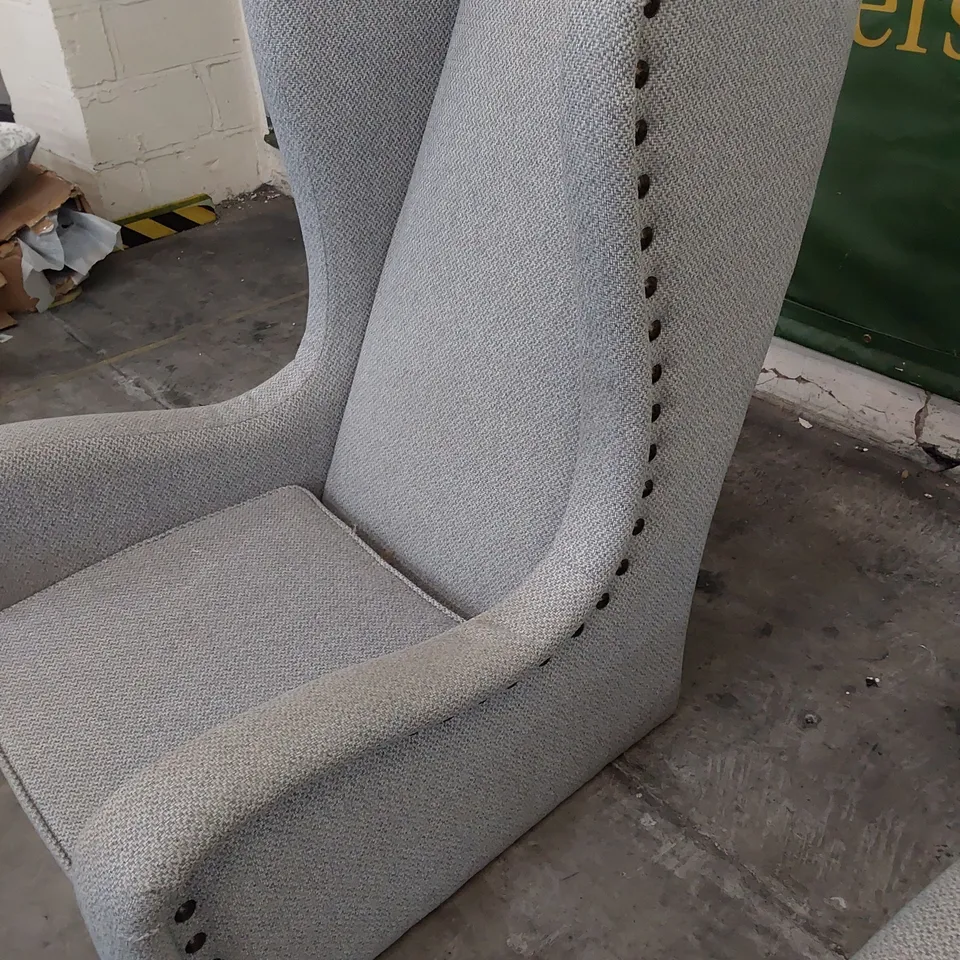 DESIGNER HIGH BACKED WINGED EASY CHAIR GREY FABRIC WITH STUDDED DETAIL 