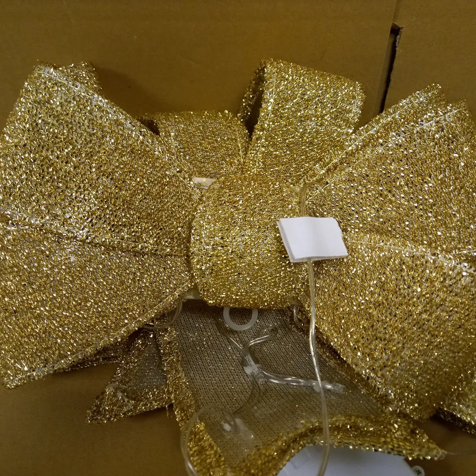 GOLD BATTERY OPERATED DOOR BOW  RRP £19.99