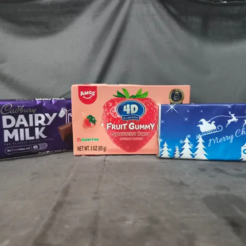 APPROXIMATELY 10 ASSORTED FOOD AND DRINK ITEMS TO INCLUDE DAIRY MILK, FRUIT GUMMY, ETC