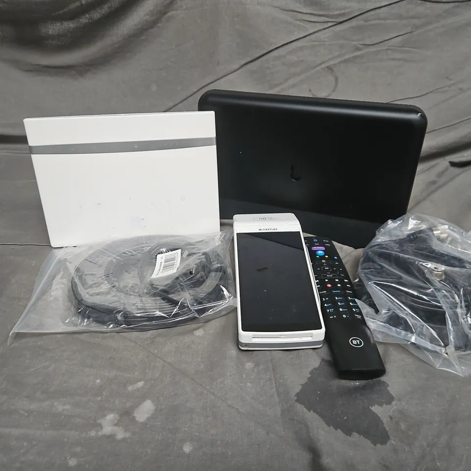 APPROXIMATELY 10 ASSORTED HOUSEHOLD ITEMS TO INCLUDE CASTLES READER, CABLES, ROUTERS, ETC