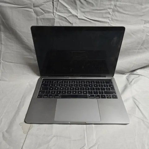 APPLE MACBOOK PRO LAPTOP – (DAMAGED)