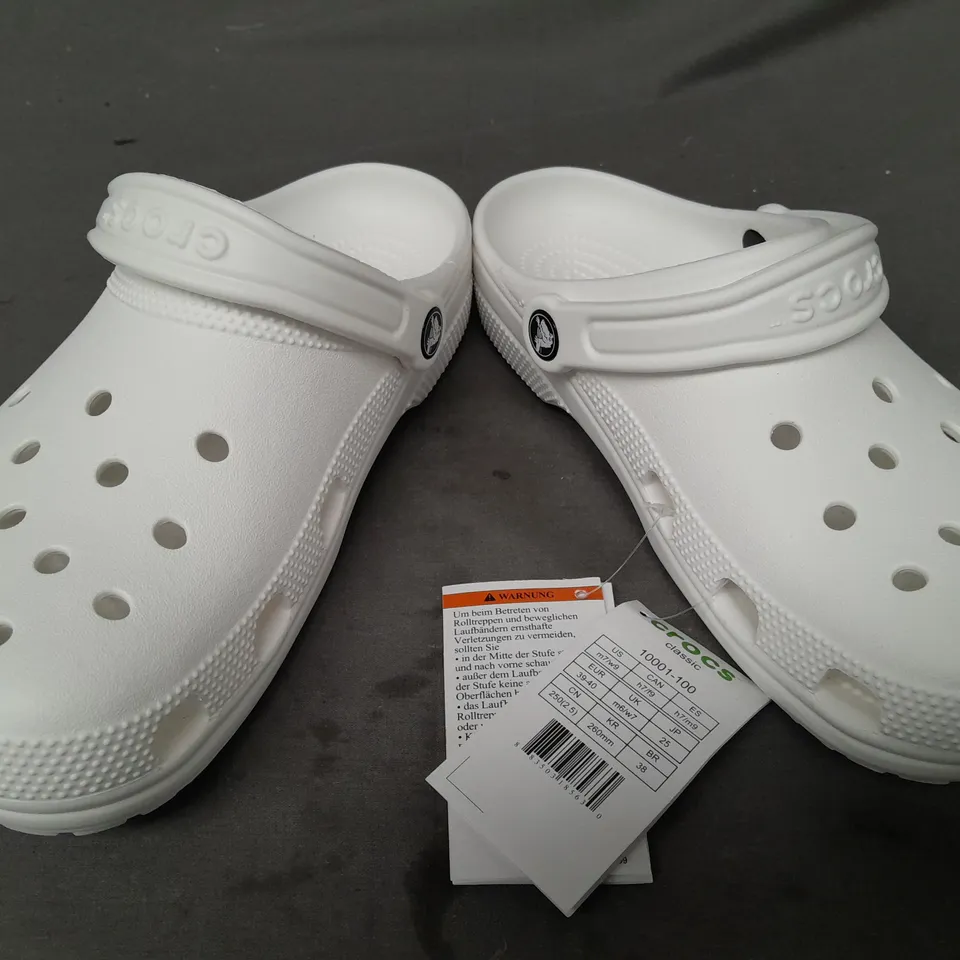 PAIR OF CROCS CLASSICS IN WHITE UK SIZE M6/W7