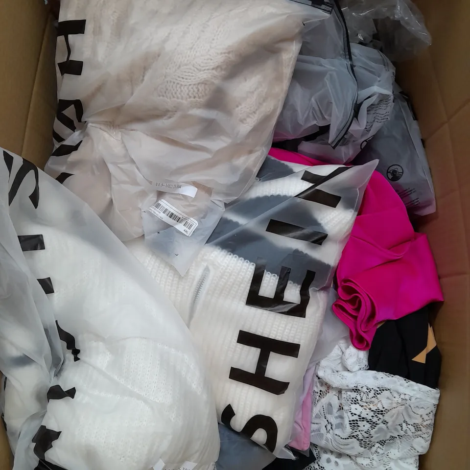 LARGE BOX OF ASSORTED CLOTHING ITEMS IN VARIOUS COLOURS AND SIZES INCLUDING DRESSES , TOPS AND JUMPERS 